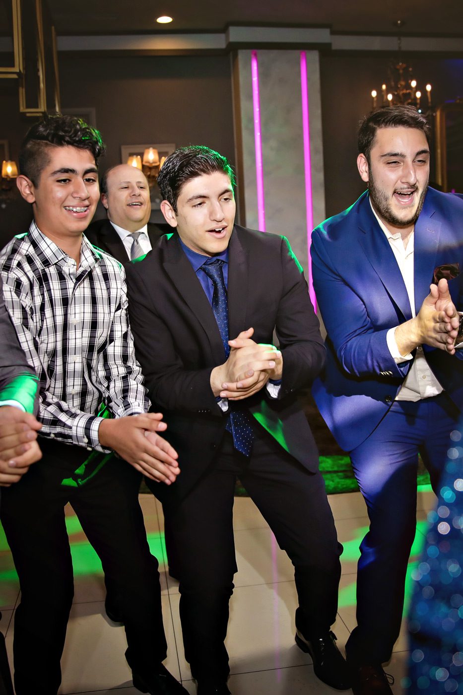 Group of men dancing at Egyptian and Armenian Engagement Party.