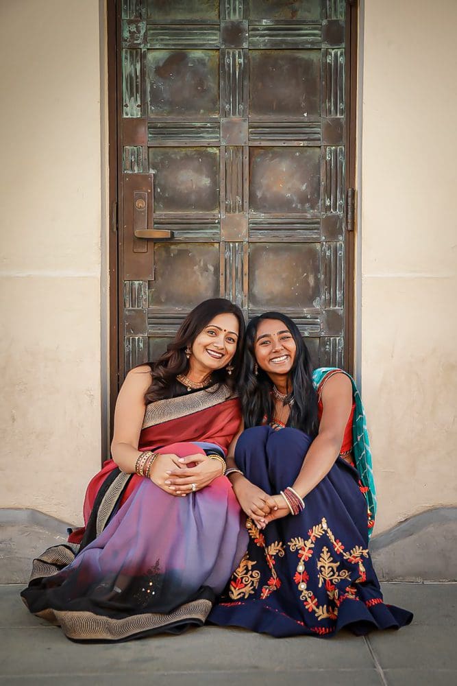 Two women in colorful traditional Indian attire at Griffith Observatory.