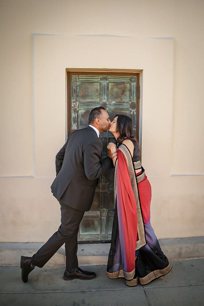 Holiday-Family-Portrait Session-Griffith Observatory-016 Couple sharing a romantic moment outdoors at Griffith Observatory.