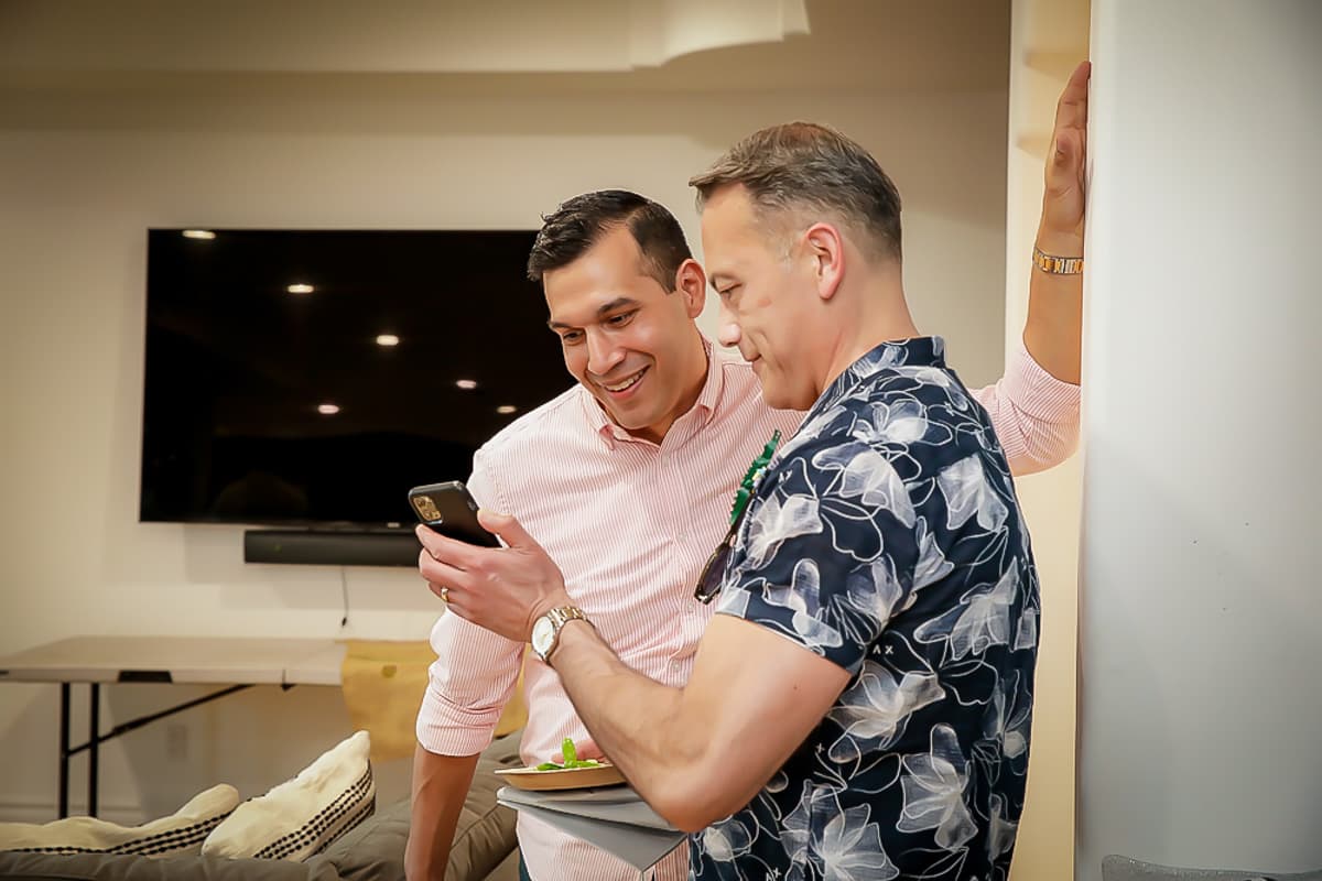 Two men engaged in conversation.